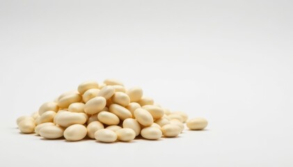 Pile of white beans against a stark white backdrop, legumes, background