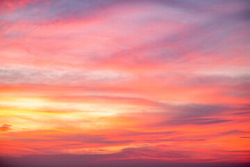 Sky,Beautiful sunset view, luxury soft gradient orange gold clouds and sunlight on the blue dramatic sky perfect for the background, morning, evening,Twilight, climate change,horizontal sunset photo