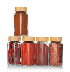 Many different aromatic spices in jars isolated on white