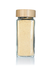 Garlic powder in spice jar isolated on white