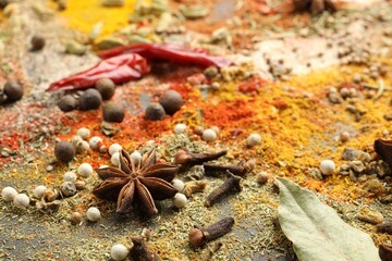 Different aromatic spices as background, closeup view