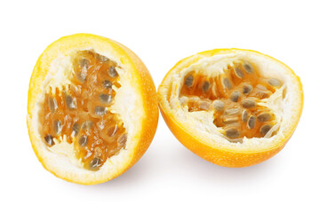 Pieces of ripe yellow passion fruit isolated on white