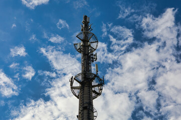 telecommunication radio tower antenna future broadband concept satellite connect clouds