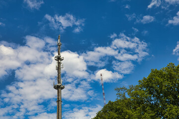 telecommunication radio tower antenna future broadband concept satellite connect clouds