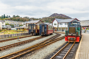 A view along the platform towards the railway station at Porthmadog, Wales in springtime