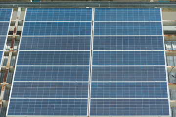 Solar panels row.Solar cells farm on the roof and sunset.Photovoltaic modules for renewable...