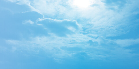 The blue sky and white clouds air indicate pure and fresh, bright weather canvas splashed with  store,m focusing on the clouds, a sunny day 