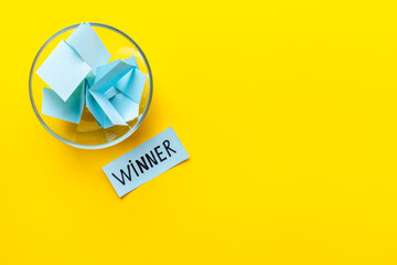Raffle tickets and winner paper with glass jar. Luck and lottery concept