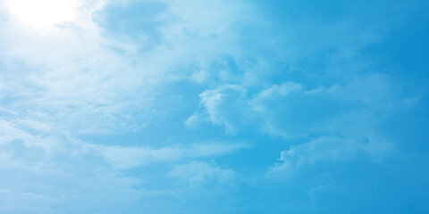 The blue sky and white clouds air indicate pure and fresh, bright weather canvas splashed with  store,m focusing on the clouds, a sunny day 