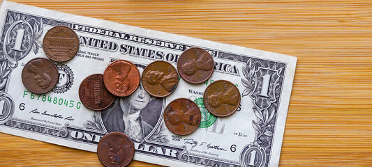 scattered banknotes and coins