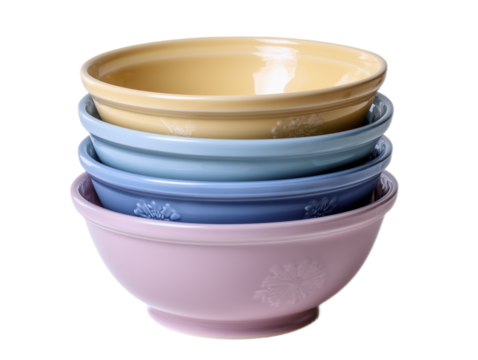 A neat stack of ceramic bowls in pastel hues, featuring intricate floral designs and a smooth finish