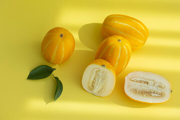 Oriental melon on yellow background