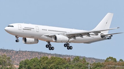 Obraz premium Commercial passenger airplane flying in clear sky with landscape below