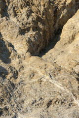 coastal rock with sun and shadow 
