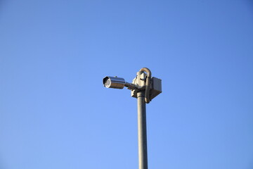 Camera is mounted on a pole in the sky