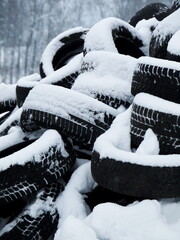 Pile of tires covered in snow