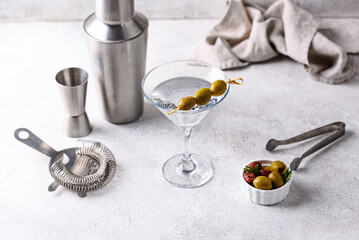 Traditional martini cocktail with olives and