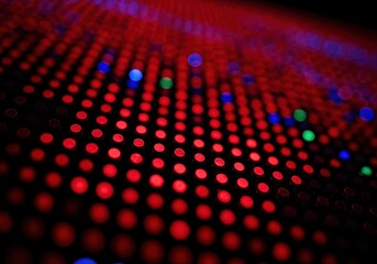 Vibrant LED Display Close-up view of illuminated pixels, showcasing a mesmerizing array of red, blue, and green lights in a grid pattern.