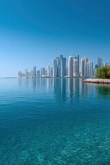 Obraz premium Clear ocean reflects a skyline showcasing modern architecture