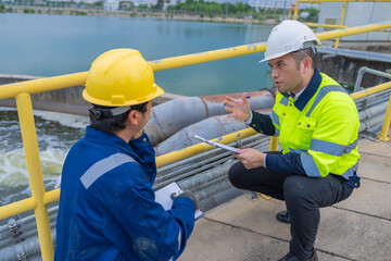 Environmental engineers work at wastewater treatment plants,Water supply engineering working at...