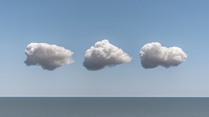 A clear blue sky dotted with soft, fluffy white clouds drifting gently across the horizon, offering a tranquil view.