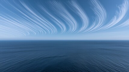 A vibrant midday sky filled with light cloud formations, offering a bright and cheerful atmosphere with clear, vivid blue.