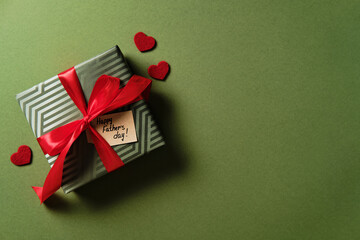 Father's day gift on green background