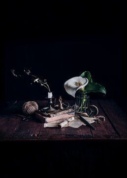 Vintage still life with books and calla lily