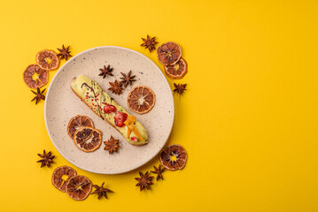 French food, dessert eclair with chocolate filling. Eclair as a background