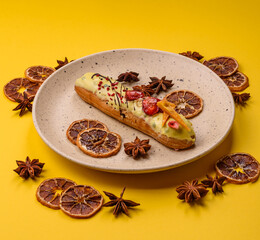 French food, dessert eclair with chocolate filling. Eclair as a background