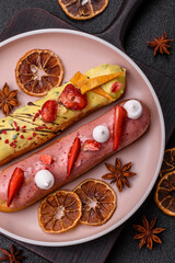 French food, dessert eclair with chocolate filling. Eclair as a background
