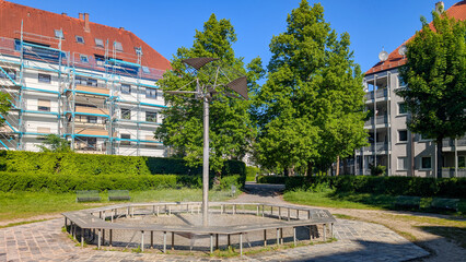 Fliegerbrunnen fountain sculpture in residential courtyard, Germany, Augsburg, 11 May 2025