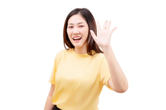 Asian young beautiful smiling in a yellow shirt waving and greeting with an open hand, wearing a yellow shirt.