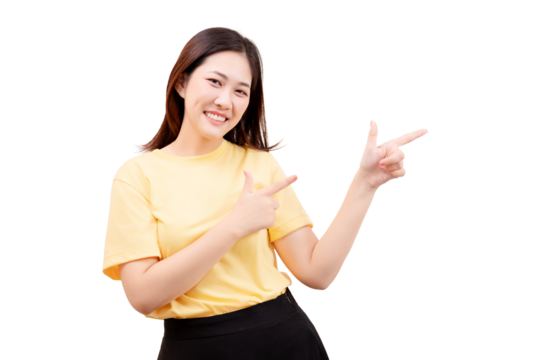 Asian young beautiful smiling in a yellow shirt pointing with both hands to the side.