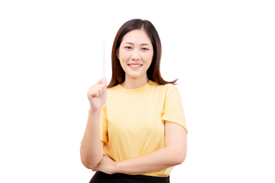Asian young beautiful smiling in a yellow shirt holds up a pen and smiles confidently.