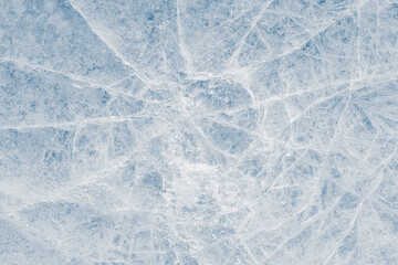 Crystalized ice background texture with cracks in a web-style in a light-blue tone.