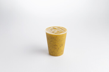 Fruit smoothie in a glass. on a white background. .