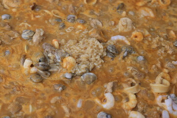 paella with seafood and meat