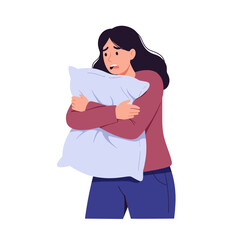 Fototapeta premium Anxious woman hugging a pillow tightly with a worried expression on her face