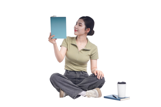 portrait of young asian female student sitting on white background posing