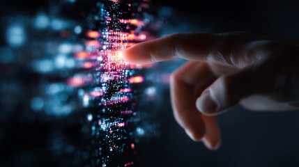 hand pushing a button on a touch screen