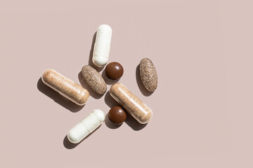 Collection of Various Dietary Supplements Including Capsules and Tablets in Different Colors and...