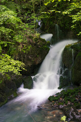 Naklejka premium Long exposure picture in a beautiful waterfall called Surjentziak in Arantzazu (Oñati - Basque Country)