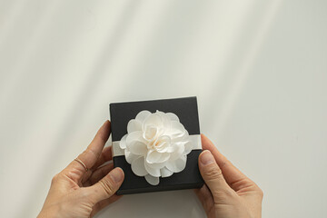 Jewelry gift box in hand