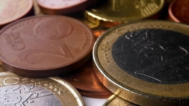 close-up view of euro coins stacked and scattered
