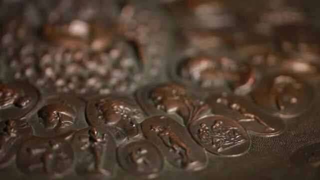 olympian gods, bronze bas-relief, close-up