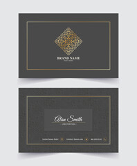 business card design with geometric ornament and gold frame