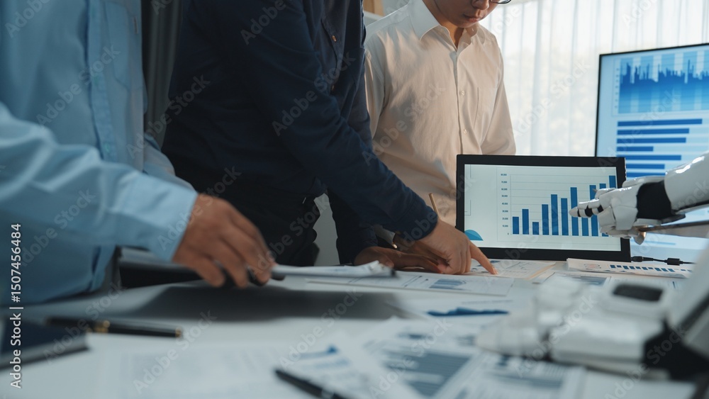 Poster a group of business professionals collaborates on data analysis, examining charts and graphs display