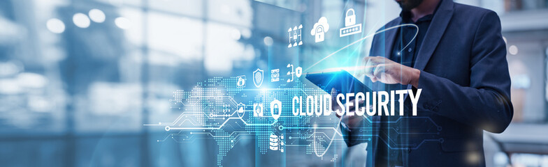 A businessman using a tablet analyzes cloud security and data growth, threat detection, encryption, and access control to protect sensitive information in a rapidly expanding digital landscape.