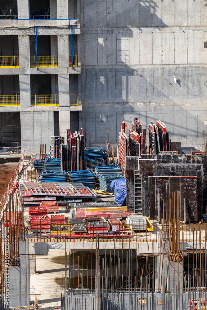 Poster construction site with formwork and rebar for a concrete building structure